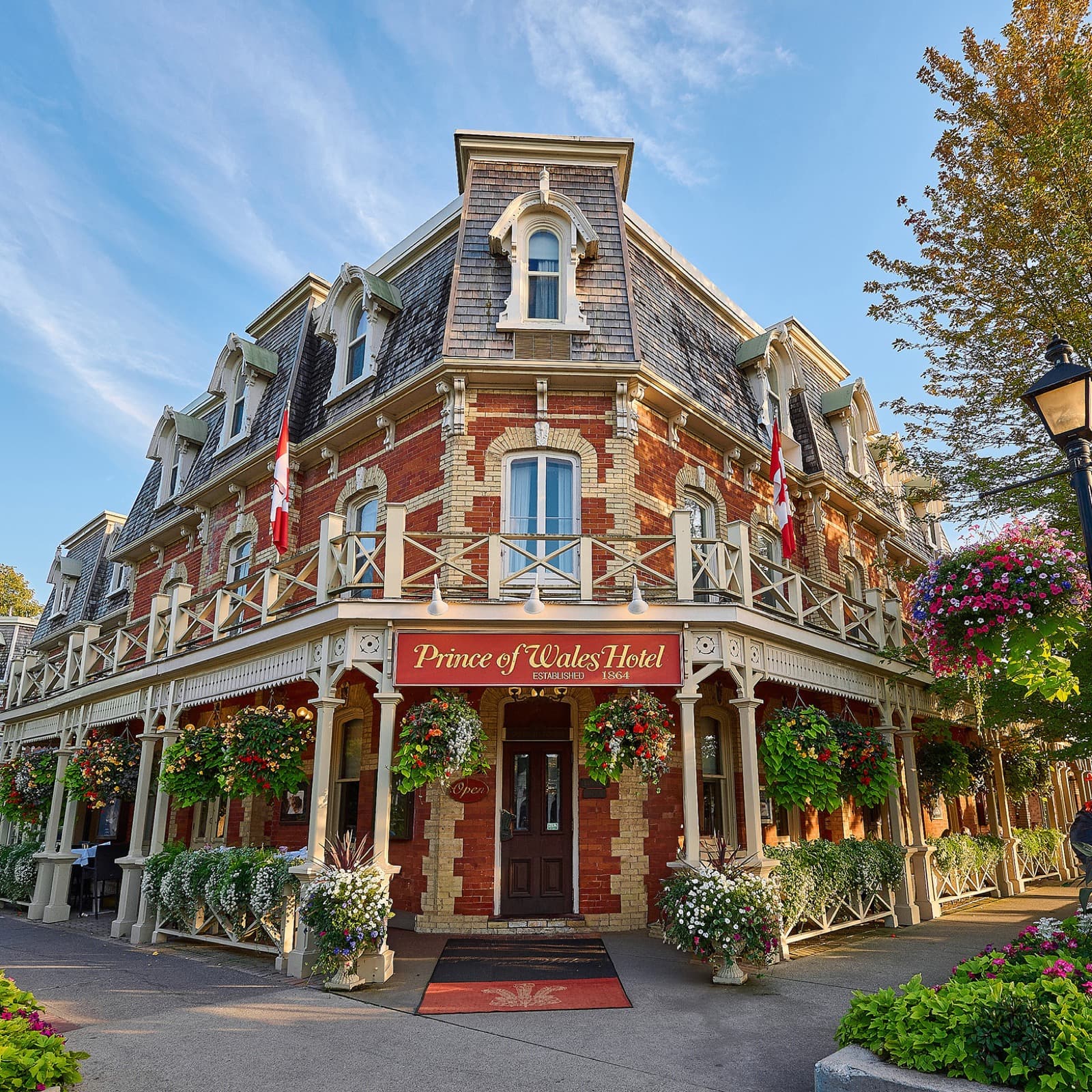 The flower-covered Victorian corner facade of the Prince of Wales Hotel