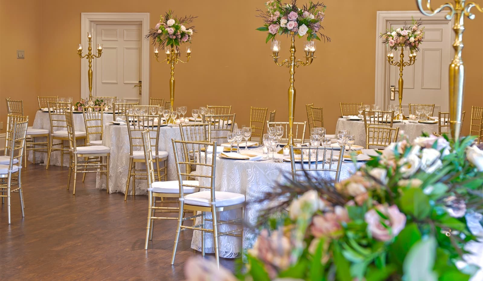Gold candelabras and roses in the Imperial Ballroom